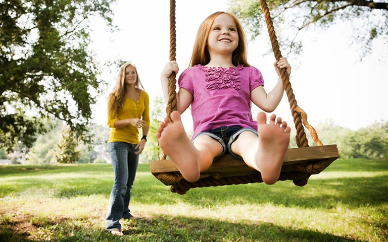 Girl on Swing